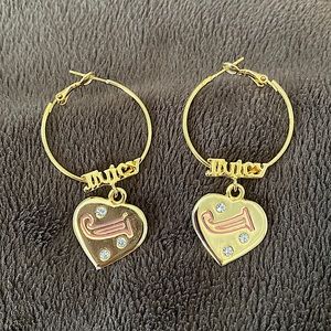 Gold Juicy Couture earrings.